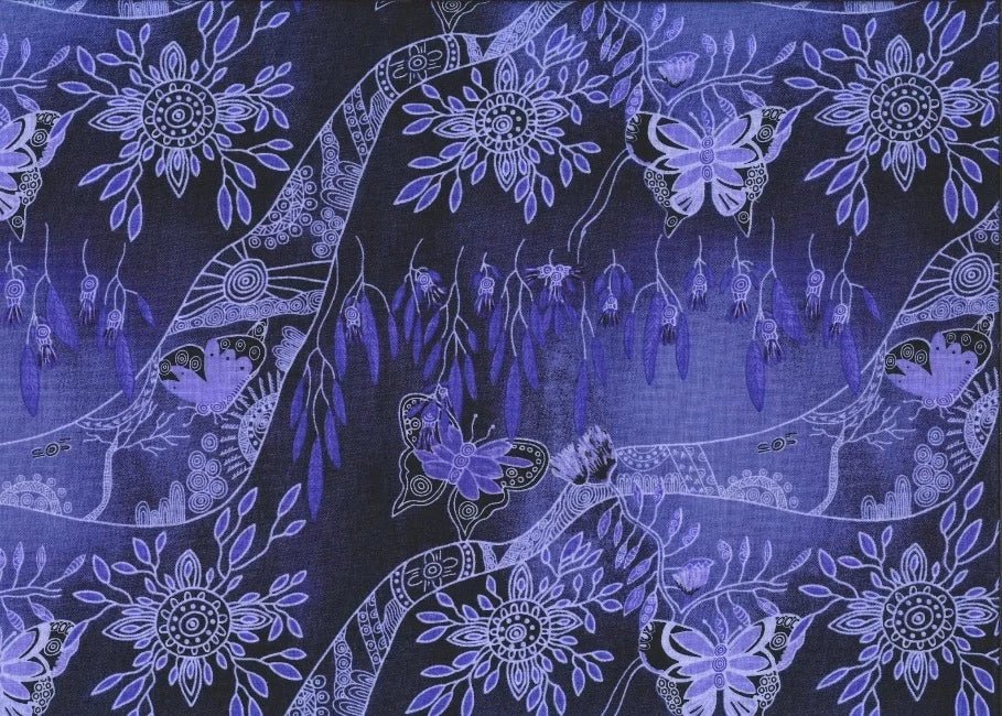 Springtime Family Gathering emerald Australian fabric by Heather Kennedy is a delightful design, featuring flowers and butterflies outlined in white, in every imaginable shade of purple, from the lightest to the almost black, on a background that is also purple and evokes a scene lit by the moon.