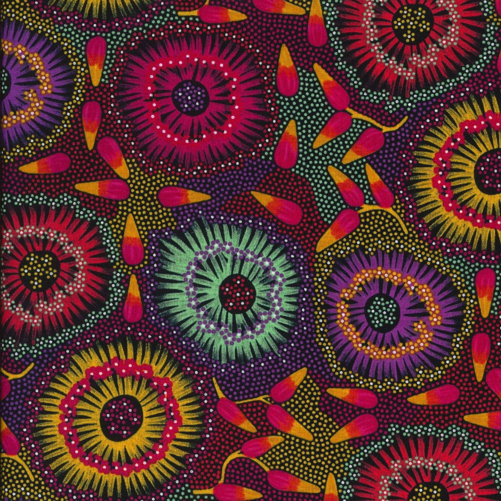 Wild Bush Banana, red, by Lauren Daneic, is a colorful explosion of flowers in red, purple, green and yellow on a multicolored background, with red/orange fruits sprinkled in between.