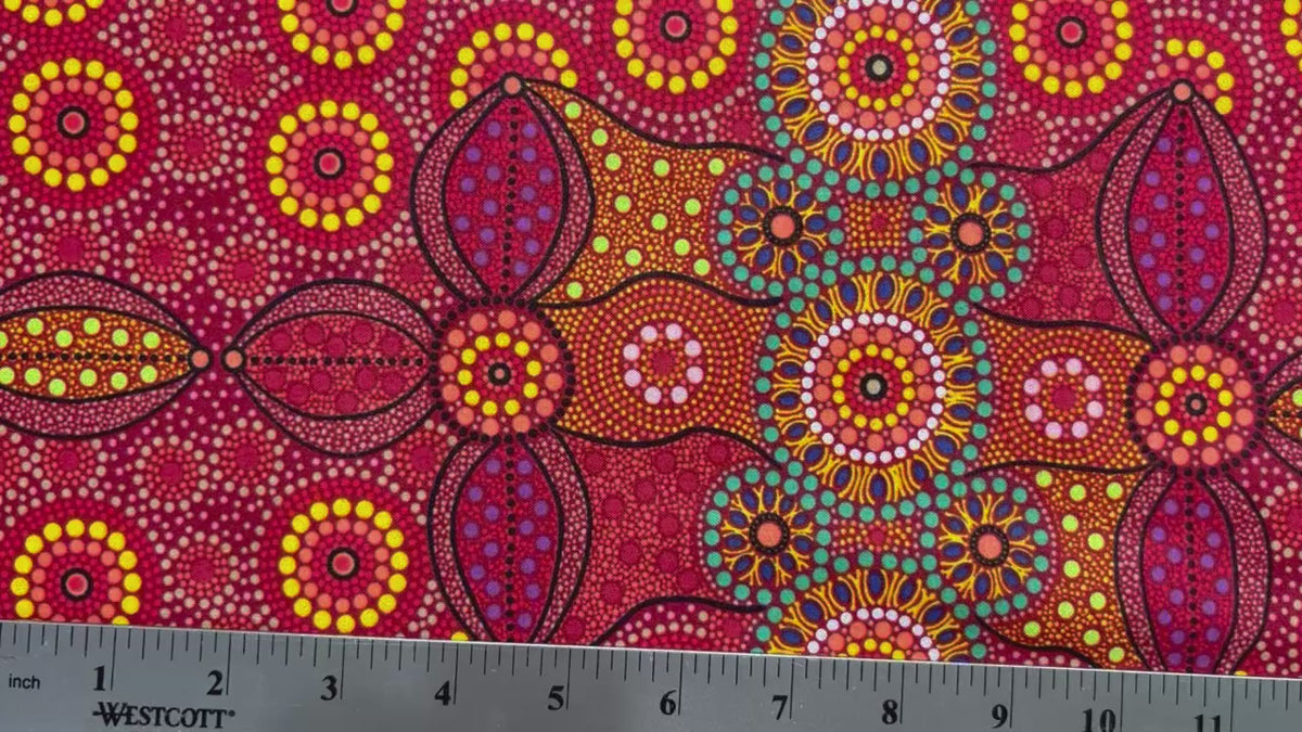 Campsite red is a striking design in vibrant shades of red, green and yellow with white circle accents by Aboriginal Artist Bernadine Wallace.