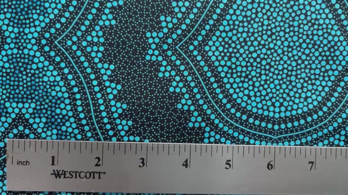 In this fabric, softly contrasting shades of sky blue, turquoise, black and white accents&nbsp;form patterns representing wind-scattered seeds and spinifex grasses—elements deeply rooted in desert life and culture.