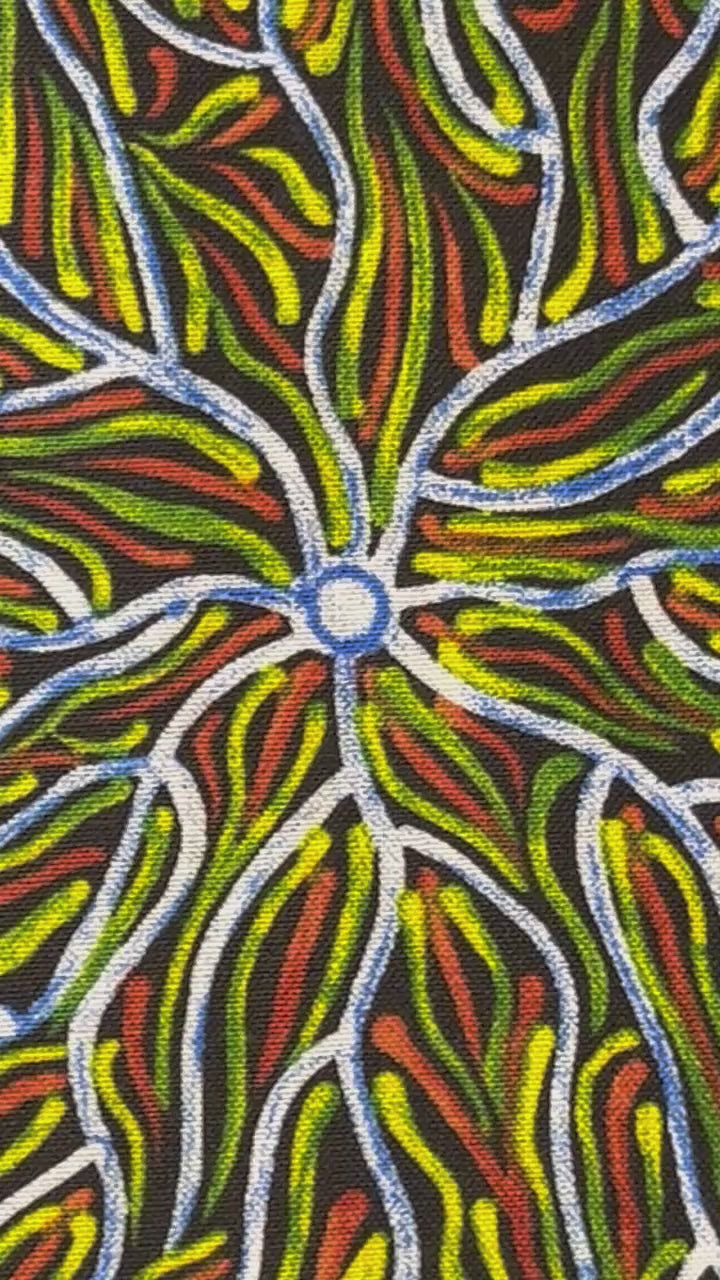 Running Water Dreaming Lemon is an intricate design of fine lines in bluish white, lemon yellow and red on a black background, simulating the rivulets of water splashing from a central waterhole. 
