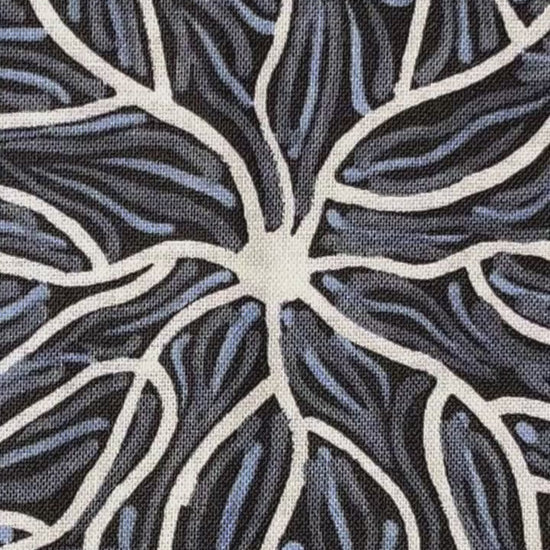 Running Water Dreaming grey is an intricate design of fine lines in white, grey and purplish grey on a black background, simulating the rivulets of water splashing from a central waterhole.