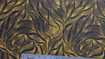 Sandhill and Waterhole Gold&nbsp;is a striking design by Aboriginal artist Anna Pitjara, featuring intricate golden yellow motifs on a deep black background.