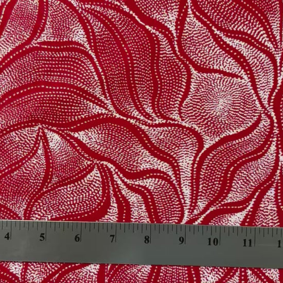 Sandhill and Waterhole Red is a striking design by Aboriginal artist Anna Pitjara, featuring intricate white motifs on a lovely red background.