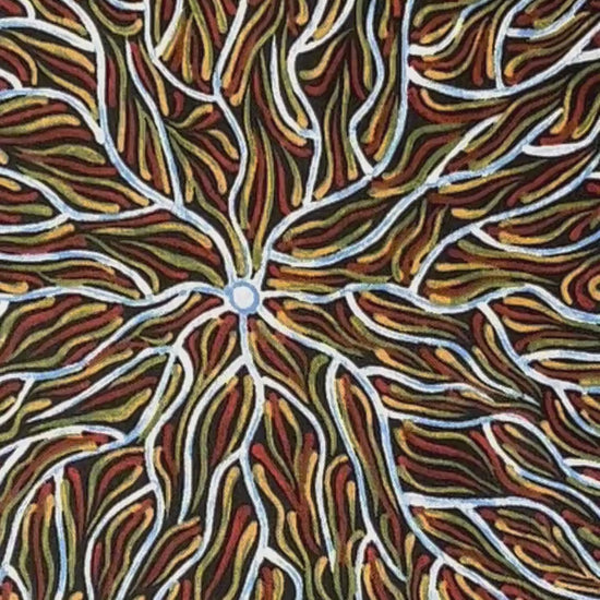 Running Water Dreaming&nbsp; brown is an intricate design of fine lines in white, brown, beige and black, simulating the rivulets of water splashing from a central waterhole.
