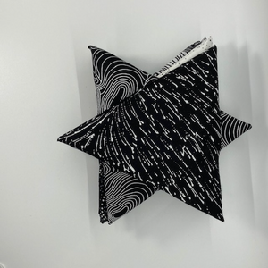 Australian Aboriginal Fabrics in black and white with a hint of grey, curated into a bundle of 10 Fat Quarters, folded into a Star Shape