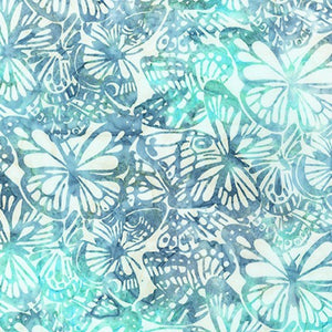 Butterflies Ivory is a lovely batik, depicting peppermint green and delft blue butterflies on a white background. 
