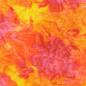 Indonesian artists created this lovely hand painted Batik fabric in a fun mix of yellow, pinks and oranges.