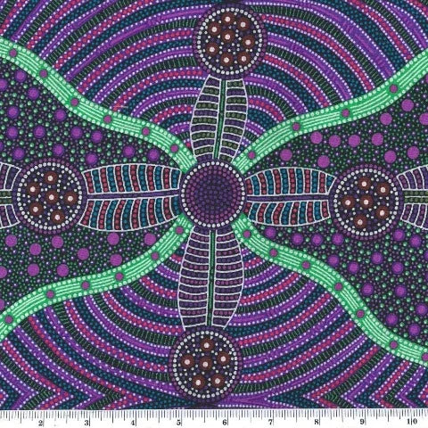 purple seeds arranged in circles and cross shapes