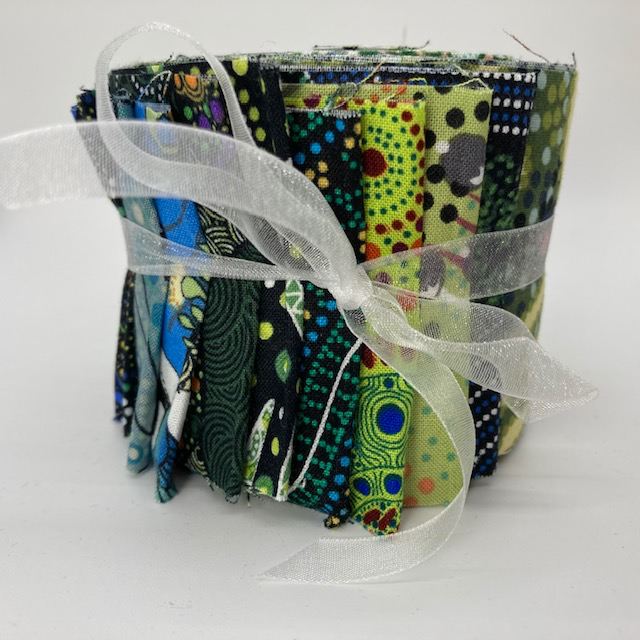 The Dreamtime Rolls of 20 green Australian Aboriginal Fabric strips (2.5" wide, 42" long) are composed of 20 different prints, one strip of each. 
