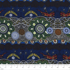 Home Country Green Australian Aboriginal fabric is a delightful design in deep shades of Navy, dark green, olive and orange, depicting flowers, boomerangs and goannas.