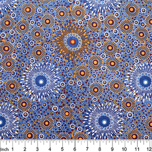 Onion Dreaming 2 Rayon in blue is a striking design of circles in orange, blue, white on a blue background. 