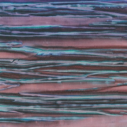 Indonesian artists created this lovely hand painted Batik fabric in warm jewel tones of purple, lavender, blackberry and dark pinks to evoke the wild blossoms of Wisteria.
