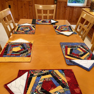 Six coordinating yet different placemats with matching napkins can be made from this pattern. 