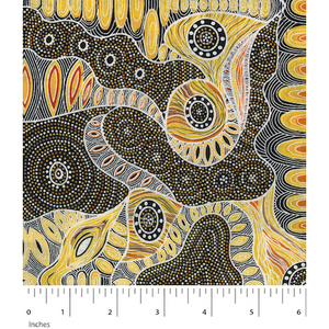 Regeneration Yellow Australian Aboriginal fabric depicts seeds after a fire in beautiful undulating waves of yellows, tan, orange and brown.