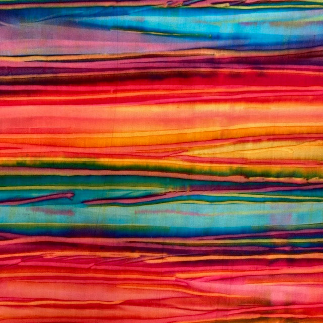 Handpainted cotton fabric in all colors of the rainbow made by artisans in Indonesia on 100 % cotton