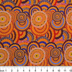 Womens Body Dreaming mustard Australian Aboriginal fabric by Cindy Wallace is a celebration of all things women: Orange, red and blue circles on a yellow background are a delight for the eye.