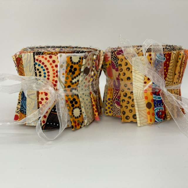 The Dreamtime Rolls of 20 yellow Australian Aboriginal Fabric strips (2.5" wide, 42" long) are composed of 20 different prints, one strip of each. 